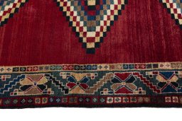Close-up detail of 2000s Persian Gabbeh rug from Iran / Persia showing Wool weave