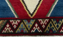 Central medallion detail of 2000s Persian Gabbeh rug from Iran / Persia