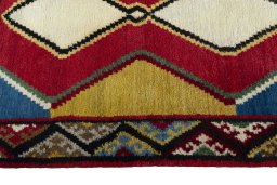 Close-up detail of 2000s Persian Gabbeh rug from Iran / Persia showing Wool weave