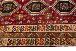 Close-up detail of 2000s Persian Gabbeh rug from Iran / Persia showing Wool weave