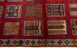 Central medallion detail of 2000s Persian Gabbeh rug from Iran / Persia