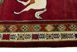 Close-up detail of 2000s Persian Gabbeh rug from Iran / Persia showing Wool weave