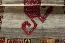 Full view of 2000s Persian Gabbeh rug from Iran / Persia, 153 × 111 cm in Beige tones