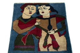 Surface texture of 2000s Persian Gabbeh rug with natural Wool and intricate pattern