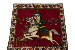 Surface texture of 2000s Persian Gabbeh rug with natural Wool and intricate pattern
