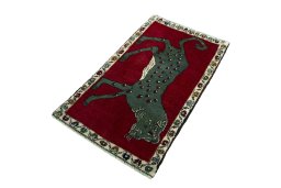 Corner detail of 2000s Persian Gabbeh rug showing border pattern and Wool pile