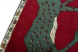 Backside of handmade 2000s Persian Gabbeh rug showing knot structure and weave density