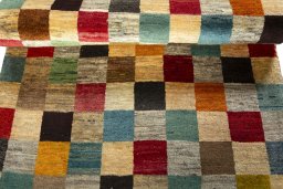 Full view of 2000s Persian Gabbeh rug from Iran / Persia, 208 × 112 cm in Multi Color tones