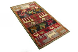 Close-up detail of 2000s Persian Gabbeh rug from Iran / Persia showing Wool weave
