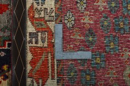 Close-up detail of 2000s Persian Gabbeh rug from Iran / Persia showing Wool weave