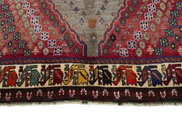 Central medallion detail of 2000s Persian Gabbeh rug from Iran / Persia