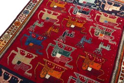 Backside of handmade 2000s Persian Gabbeh rug showing knot structure and weave density