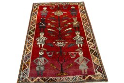 Surface texture of 2000s Persian Gabbeh rug with natural Wool and intricate pattern