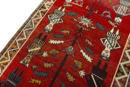 Backside of handmade 2000s Persian Gabbeh rug showing knot structure and weave density