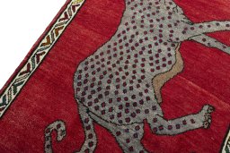 Backside of handmade 2000s Persian Gabbeh rug showing knot structure and weave density
