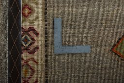 Close-up detail of 2000s Persian Gabbeh rug from Iran / Persia showing Wool weave
