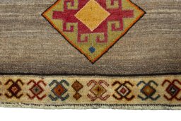 Central medallion detail of 2000s Persian Gabbeh rug from Iran / Persia