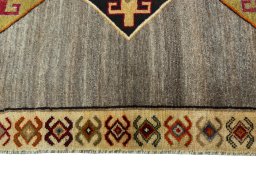 Close-up detail of 2000s Persian Gabbeh rug from Iran / Persia showing Wool weave