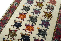 Backside of handmade 2000s Persian Gabbeh rug showing knot structure and weave density