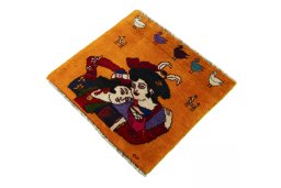Corner detail of 2000s Persian Gabbeh rug showing border pattern and Wool pile