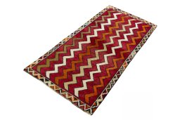 Corner detail of 2000s Persian Gabbeh rug showing border pattern and Wool pile