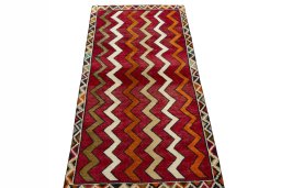 Surface texture of 2000s Persian Gabbeh rug with natural Wool and intricate pattern