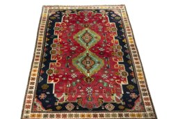 Surface texture of 2000s Persian Gabbeh rug with natural Wool and intricate pattern