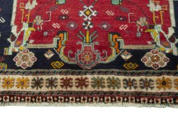 Central medallion detail of 2000s Persian Gabbeh rug from Iran / Persia