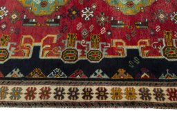Close-up detail of 2000s Persian Gabbeh rug from Iran / Persia showing Wool weave