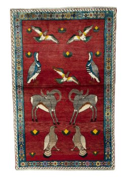 Full view of 2000s Persian Gabbeh rug from Iran / Persia, 202 × 128 cm in Red tones
