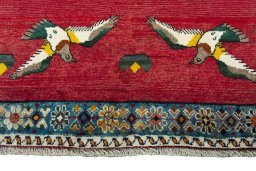 Central medallion detail of 2000s Persian Gabbeh rug from Iran / Persia