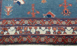 Central medallion detail of 2000s Persian Gabbeh rug from Iran / Persia