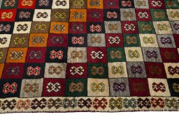 Central medallion detail of 2000s Persian Gabbeh rug from Iran / Persia