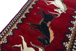 Backside of handmade 2000s Persian Gabbeh rug showing knot structure and weave density