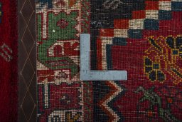 Close-up detail of 2000s Persian Gabbeh rug from Iran / Persia showing Wool weave