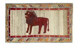 Full view of 2000s Persian Gabbeh rug from Iran / Persia, 245 × 146 cm in Beige tones