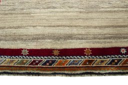 Central medallion detail of 2000s Persian Gabbeh rug from Iran / Persia
