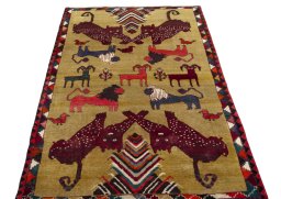 Surface texture of 2000s Persian Gabbeh rug with natural Wool and intricate pattern