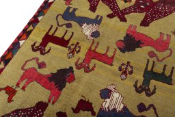 Backside of handmade 2000s Persian Gabbeh rug showing knot structure and weave density