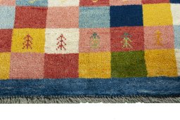 Central medallion detail of 2000s Persian Gabbeh rug from Iran / Persia