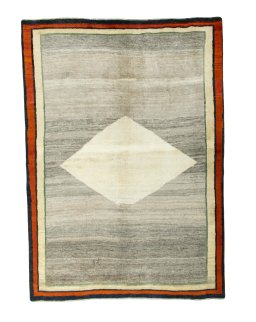 Full view of 2000s Persian Gabbeh rug from Iran / Persia, 275 × 197 cm in Beige tones