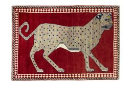 Full view of 2000s Persian Gabbeh rug from Iran / Persia, 145 × 103 cm in Red tones