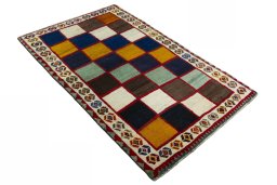 Close-up detail of 2000s Persian Gabbeh rug from Iran / Persia showing Wool weave