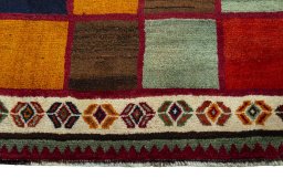 Central medallion detail of 2000s Persian Gabbeh rug from Iran / Persia