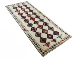 Close-up detail of 2000s Persian Gabbeh rug from Iran / Persia showing Wool weave