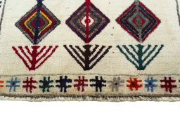 Central medallion detail of 2000s Persian Gabbeh rug from Iran / Persia