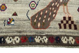 Central medallion detail of 2000s Persian Gabbeh rug from Iran / Persia