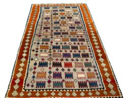 Surface texture of 2000s Persian Gabbeh rug with natural Wool and intricate pattern