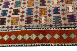 Close-up detail of 2000s Persian Gabbeh rug from Iran / Persia showing Wool weave