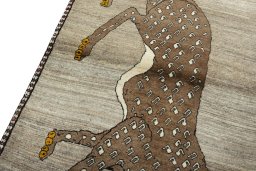 Backside of handmade 2000s Persian Gabbeh rug showing knot structure and weave density